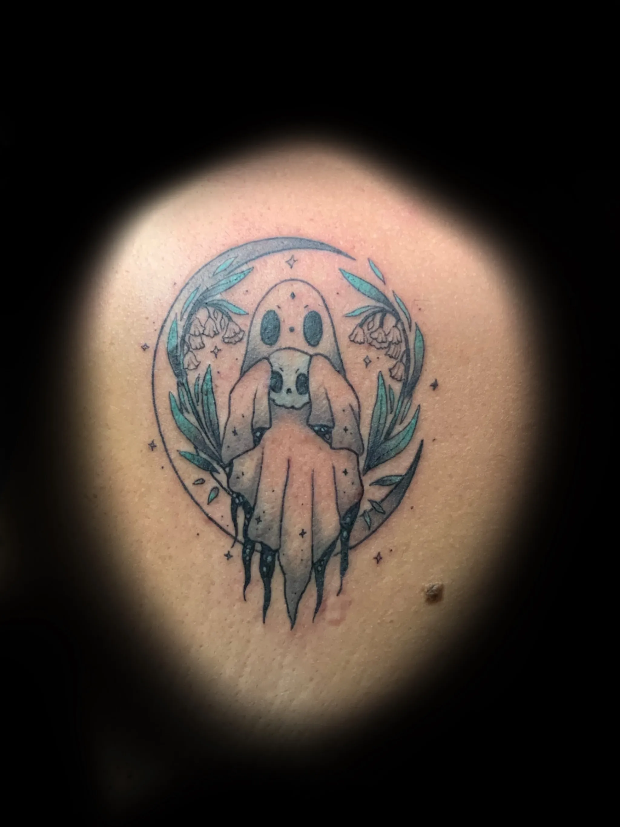 Small fine line spirit tattoo with ornamental details