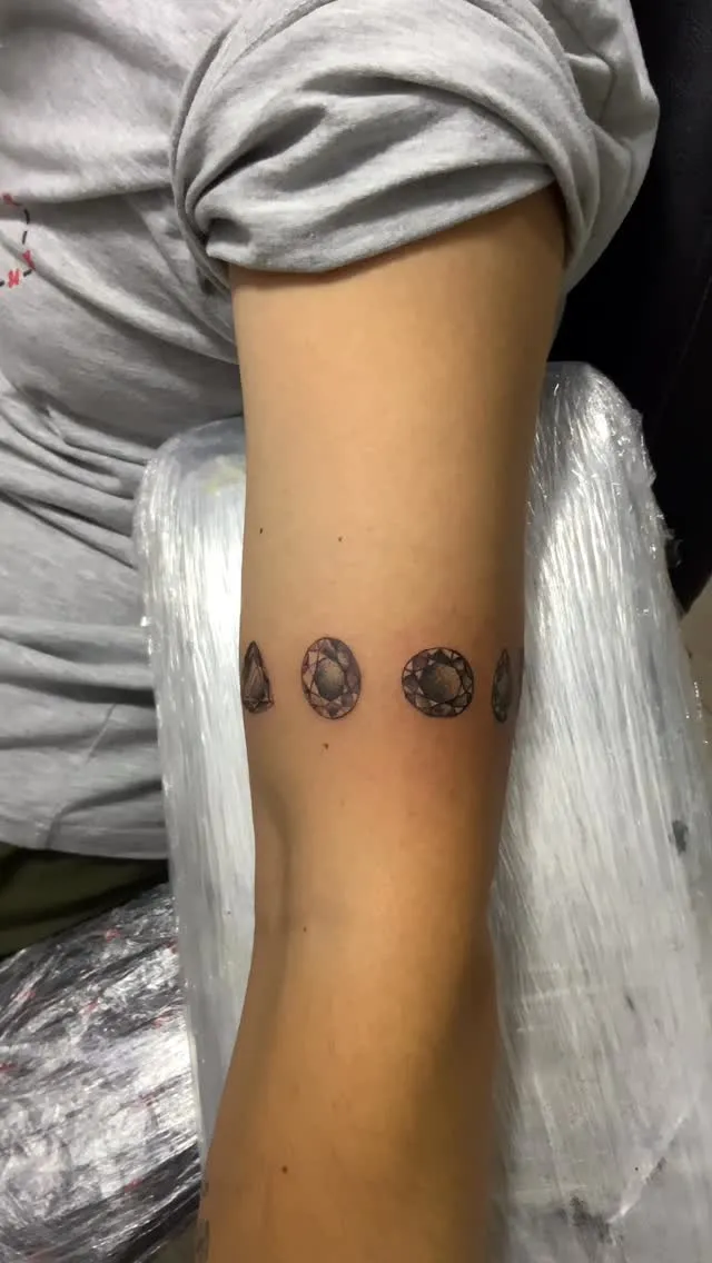 Minimal geometric diamond shapes tattoo